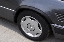 Накладки на арки 1989-1995 (4 шт, чорні, ABS-пластик) Mercedes E-сlass W124 1984-1997 рр.