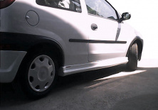 Бічні спідниці (під фарбування) для Opel Corsa C 2000-2006 рр