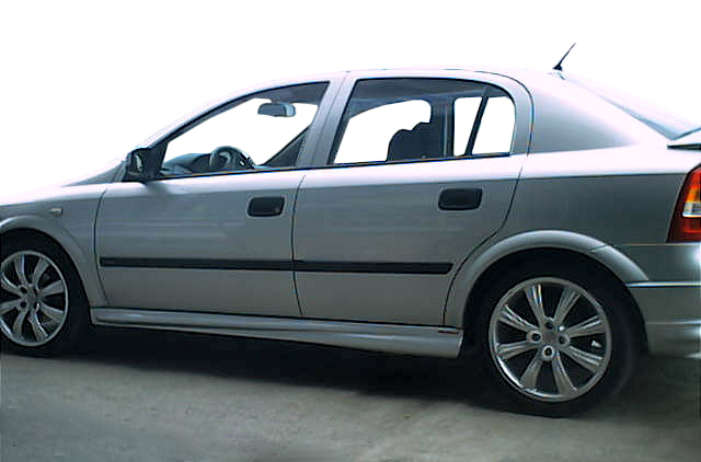 Бічні пороги HB (під фарбування) для Opel Astra G classic 1998-2012 рр