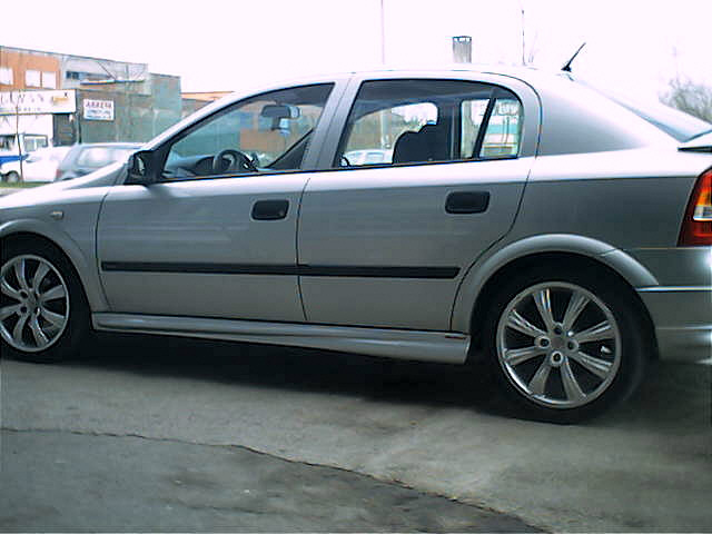 Бічні пороги HB (під фарбування) для Opel Astra G classic 1998-2012 рр