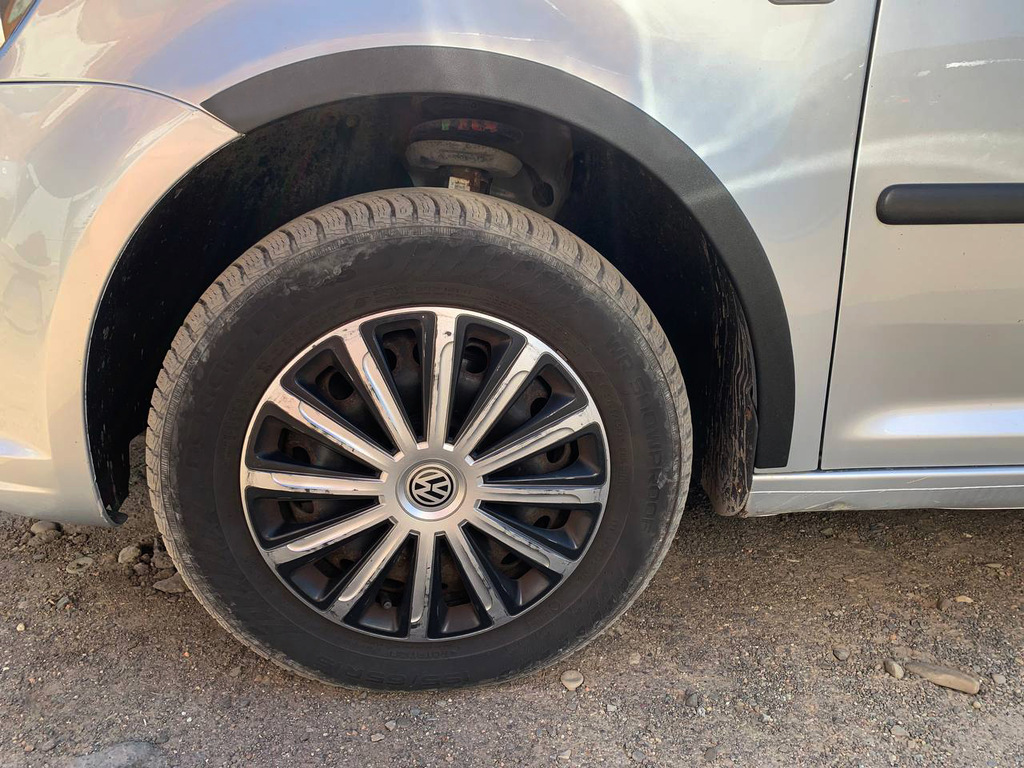 Накладки на арки (чорний мат) Коротка база, 2 бічних (пластик) для Volkswagen Caddy 2010-2015 рр