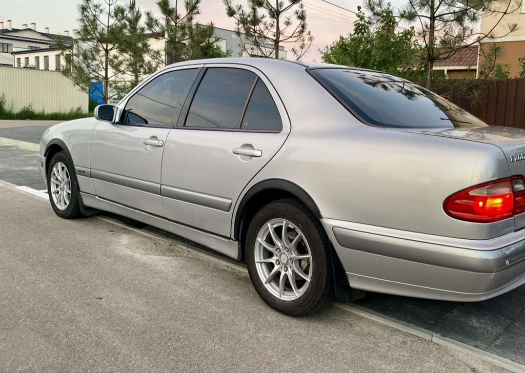 Накладки на арки (4 шт, чорні) для Mercedes E-сlass W210 1995-2002 рр