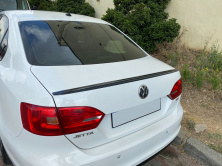 Спойлер LIP (Sunplex, чорний) (115,8см * 6,3см) Volkswagen Jetta 2011-2018 рр.